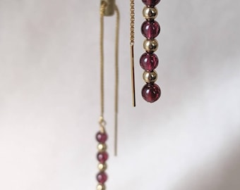 Delicate garnet and gold-filled ball dangles