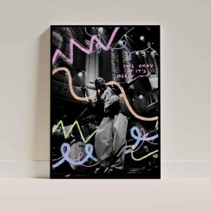 May include: Black and white photograph of a person singing on stage with colourful scribbles and the text "It's okay if it's messy" on a black background.