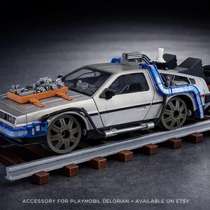 Railroad tracks for the 1-24 Playmobil Back to the future Delorean.