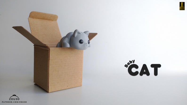 May include: A grey 3D printed baby cat figurine peeking out of a brown cardboard box. The text "Baby CAT" is printed in black on a white background.