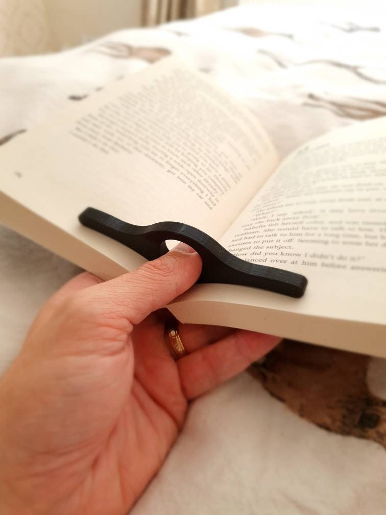 Thumb thing clearance book page holder