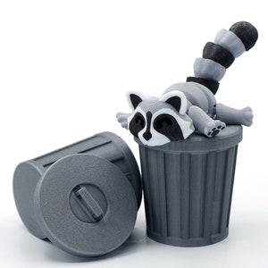 Adorable Articulated racoon with trash can