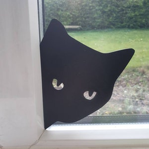 Cat Peeking Silhouette image 1