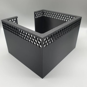 May include: A black plastic storage box with a honeycomb pattern on the sides. The box is open on one side, revealing the empty interior.