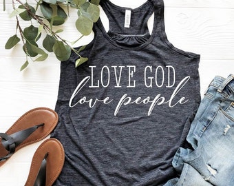 May include: A dark gray tank top with the text "LOVE GOD love people" in white lettering.