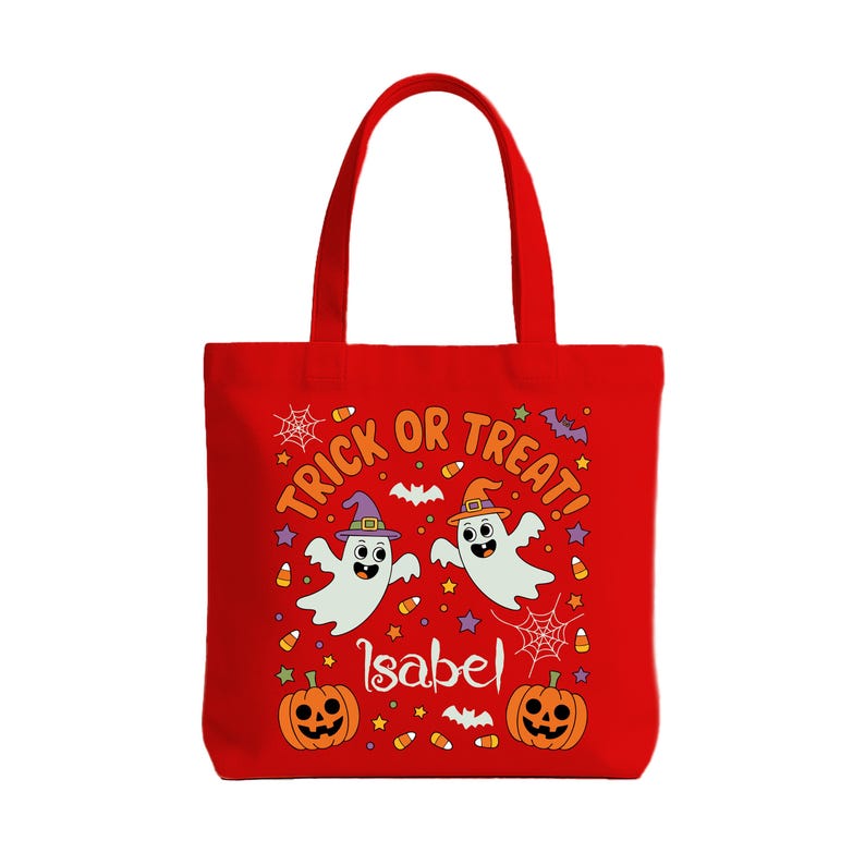 May include: Red Halloween tote bag with white ghosts wearing witch hats, pumpkins, and the text "Trick or Treat!" and "Isabel". The bag has a handle for carrying.