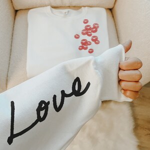 MY LIPS ARE SEALED COZY SWEATSHIRT - WORN WHITE
