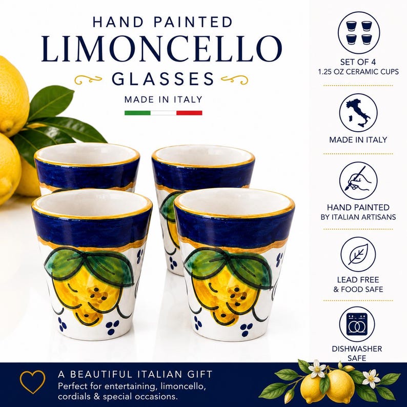 May include: Set of four hand-painted ceramic Limoncello glasses. Each glass features a white base with a yellow lemon design, blue rim, and gold accents. The glasses are 1.25 oz and made in Italy.