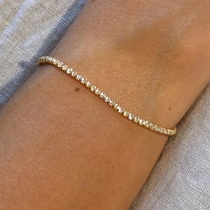 Bracelet tennis scintillant pleine longueur en argent plaqué or