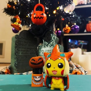 Pikachu in Mega Y Poncho