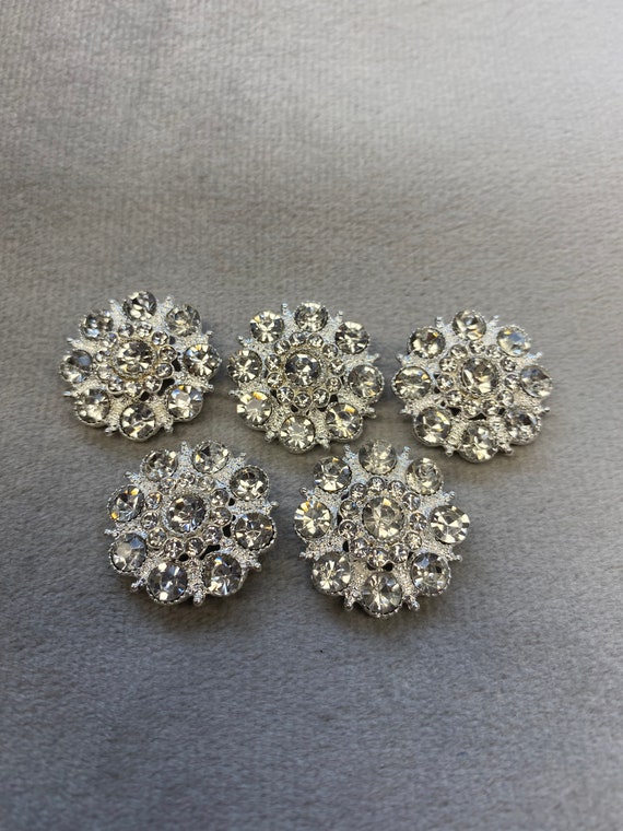 Rhinestone buttons silver in a gold tone metal setting 25mm a set of 5