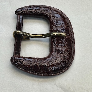 Brown buckle with a prong mock Croc design to fit a belt 30mm