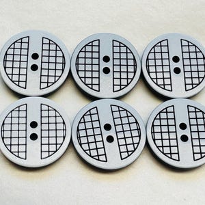 White buttons 23mm a set of six with a black check design