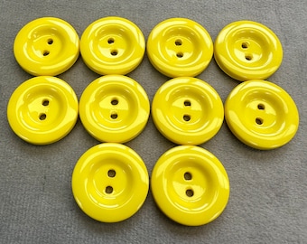 Lot de 10 boutons jaunes 23 mm, finition brillante