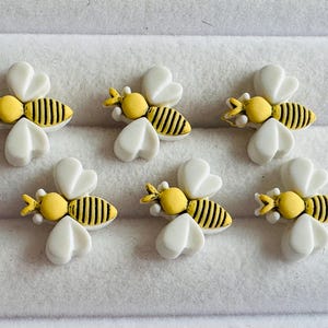 Bee buttons, 15mm, cute novelty design on a shank, sold as a set of six buttons. For clothing, crafting, homewares, fashion projects gifts