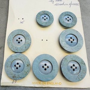 Vintage echte hoornen knopen op originele voorbeeldkaart
