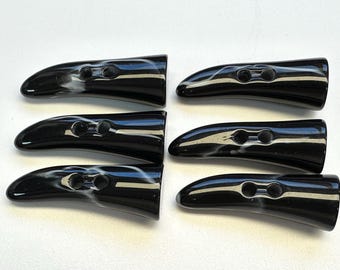 Black toggles 52mm sew-through with grey detail. Sold as a set of six toggles.