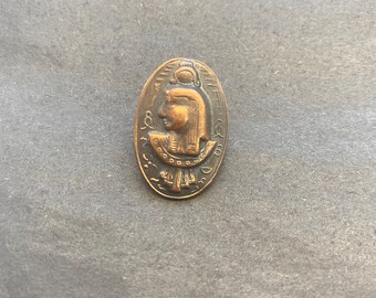 Vintage button Egyptian profile with hieroglyphics 17mm x 21mm metal