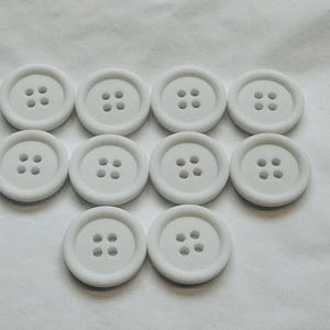White buttons 20mm matt finish border design sold as a set of ten buttons sew-through