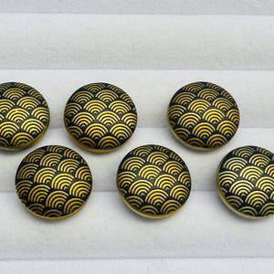 Black buttons 17mm a set of six with an art-deco inspired gold-tone design
