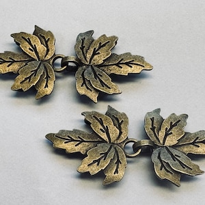 Fermagli a forma di foglia in metallo color oro invecchiato 3,1 x 6,7 cm, set da 2