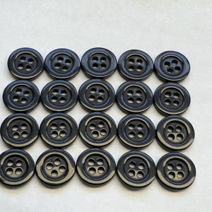Black buttons 13mm with a gloss finish classic style sold as a set of twenty buttons