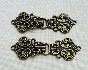 Antieke gouden metalen sluitingen 5,8 cm sierlijke sluitingen vest cape kleermakerij set twee