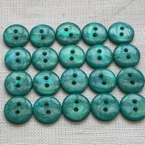 Turquoise buttons 12mm pearlised iridescent finish sew through a set of twenty