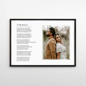 May include: A black framed print with a poem titled "To My Beloved" and a photograph of a couple. The poem is in black text on a white background. The photograph shows a man and woman standing close together.