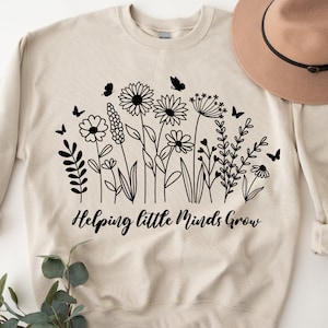 Fichiers Svg Wilflower, aider les petits esprits à grandir, Svg enseignant, Svg chemise enseignant, Svg fleur, Svg fleurs sauvages, citation Svg fleurs sauvages, png.