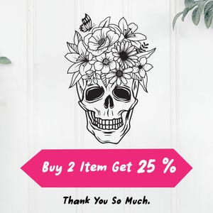 May include: Black and white line art illustration of a skull with a floral crown. The skull is smiling and has flowers in its eye sockets. The flowers are stylized and include butterflies. The text "Buy 2 Item Get 25%" and "Thank You So Much." is below the image.