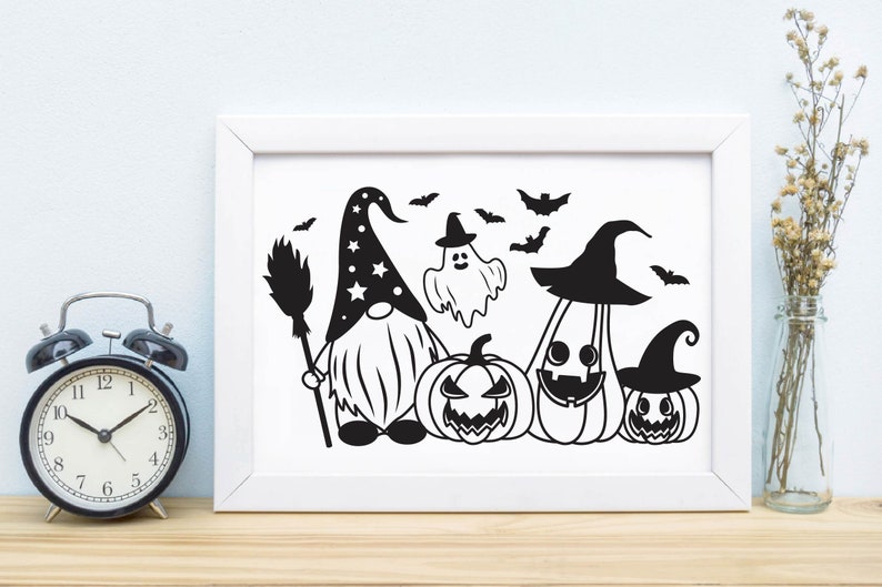 May include: Black and white illustration of a gnome wearing a pointed hat with stars, holding a broom, standing next to a ghost and three pumpkins with witch hats. The pumpkins have scary faces.