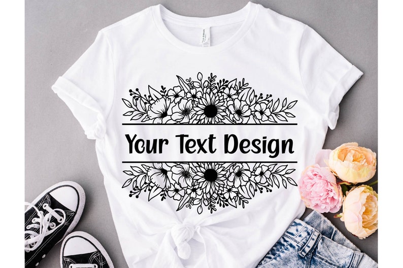 K&ouml;nnte beinhalten: Wei&szlig;es T-Shirt mit einem schwarzen Blumendesign und dem Text "Your Text Design".