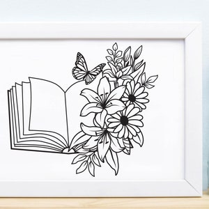 May include: A black and white line drawing of an open book with flowers and a butterfly. The book is open and the pages are blank. The flowers are lilies and daisies. The butterfly is perched on the top of the book.