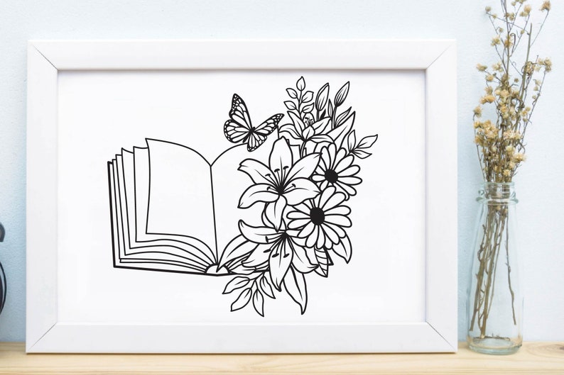 May include: A black and white line drawing of an open book with flowers and a butterfly. The book is open and the pages are blank. The flowers are lilies and daisies. The butterfly is perched on the top of the book.