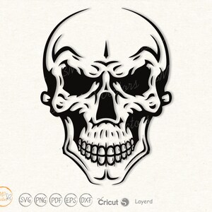 May include: Black and white illustration of a skull with a detailed design. The skull has a wide open mouth with teeth showing.