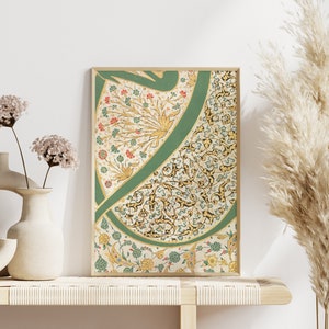 May include: A framed print of a traditional Islamic design with intricate floral patterns in gold, green, and red on a white background.