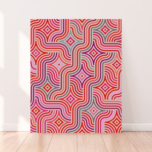 May include: Abstract geometric pattern with red, pink, and gray lines and shapes. The pattern is repeated throughout the image.