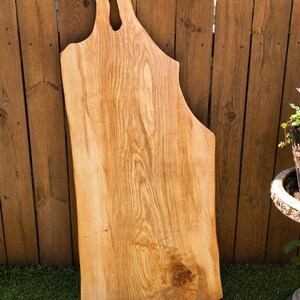 Massive curly maple charcuterie board with turquoise inlay