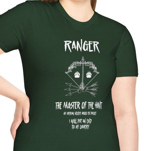 Dungeons & Dragons inspired t-shirt with an image of a bow nocked with an arrow pointing upward, flanked by bear footprints, and three arrows are crossed beneath the bow along with the word ranger overhead