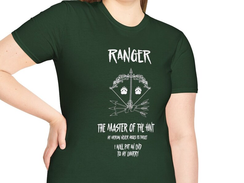 Dungeons & Dragons inspired t-shirt with an image of a bow nocked with an arrow pointing upward, flanked by bear footprints, and three arrows are crossed beneath the bow along with the word ranger overhead