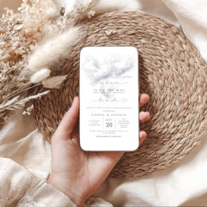 May include: A rectangular invitation card with rounded corners, featuring a cloud design and the text "a little piece of heaven." The card includes details for a gender reveal event, with the names Carol & Joshua, and the date December 20th.
