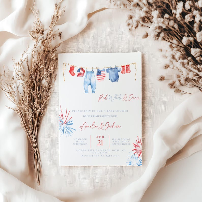 May include: Baby shower invitation featuring watercolour illustrations of baby clothes in red, white, and blue. The invitation includes the text "Red, White & Due" and details for Amelia & Joshua's baby shower, including the date, time, and location.