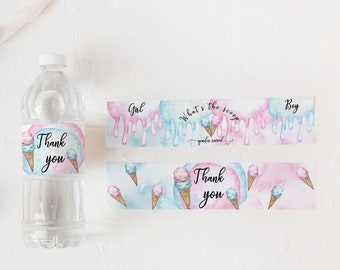 May include: Water bottle labels with a pink and blue ice cream cone design. The labels say "What's the scoop? Gender reveal" and "Thank you".