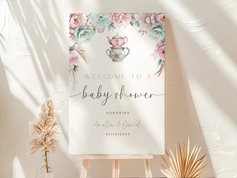 K&ouml;nnte beinhalten: Ein wei&szlig;es Schild mit floralen Illustrationen und einem Teetassen-Design. Das Schild lautet "Willkommen zu einer Babyparty zu Ehren von Amelia & David 02103120XX".