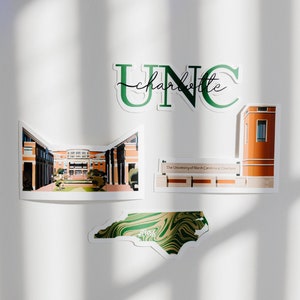 May include: A set of four stickers featuring the University of North Carolina at Charlotte. The stickers include the school's logo, a building on campus, the school's name, and a map of North Carolina.