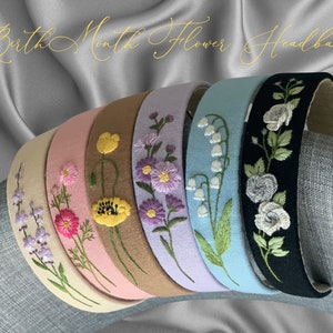 May include: Six fabric headbands arranged in a row, each featuring unique floral embroidery. The colors include beige, pink, tan, lavender, light blue, and black. The text Birth Month Flower Headbands is displayed at the top of the image.