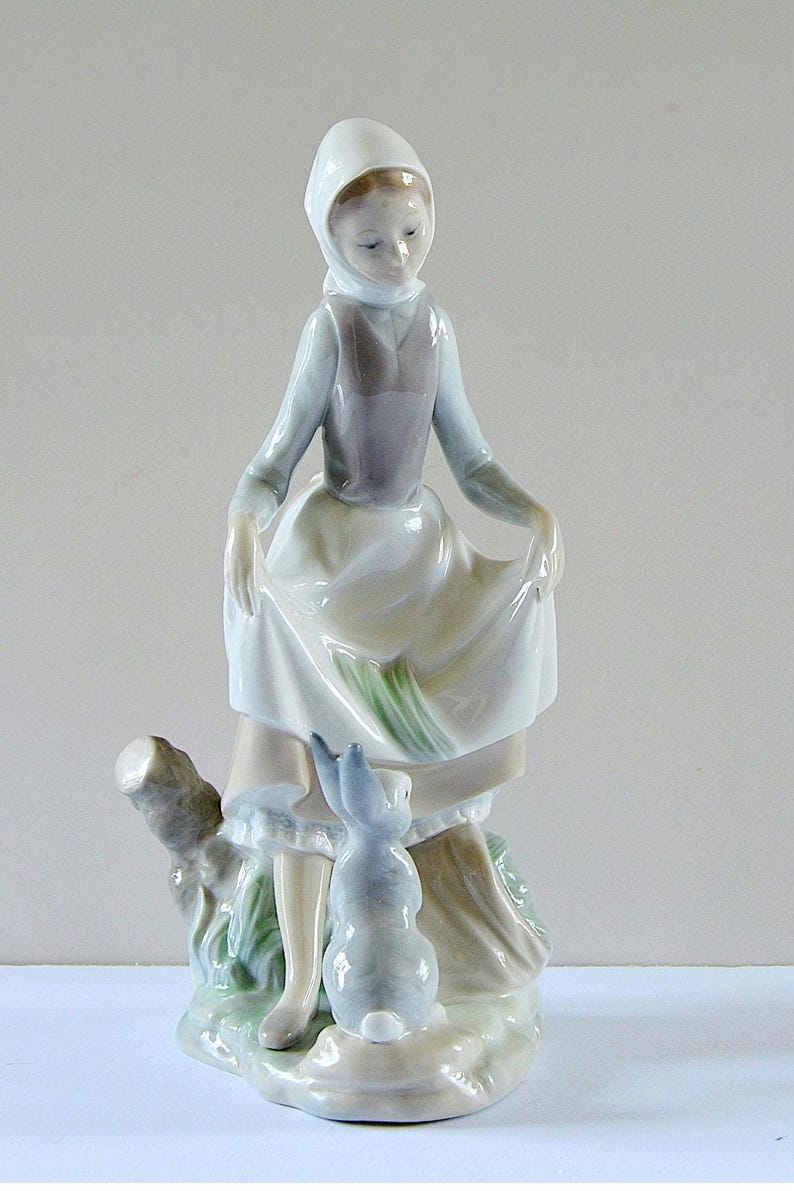 Retired Lladro Porcelain Figurine: Girl with Rabbit, #4826 (1972-1991) image 1