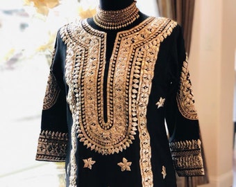 Lehereya kurta hand painted to form the lehereya pattern; adorned with intricate ari and sequin hand work.