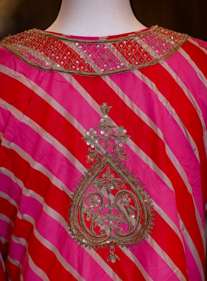Lehereya kurta hand painted to form the lehereya pattern; adorned with intricate ari and sequin hand work.